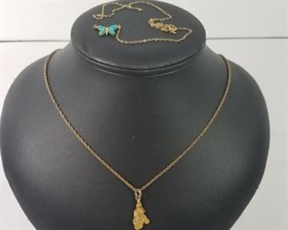 2 Gold Necklaces with Charms https://ctbids.com/#!/description/share/252886