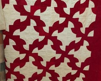 1930's handsewn and hand quilted Drunkard's Path quilt