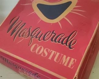 Several Vintage halloween mask inside Box
