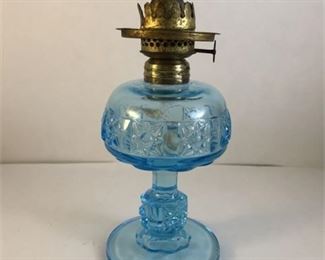 Lot 002
Antique U.S. Glass Co. hurricane night lamp Stars & Bars pattern in blue (rare)