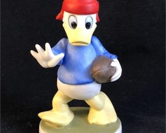 Lot 009
Walt Disney Donald Duck bisque football figurine