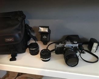 Olympus 35mm with 70-210 mm lens