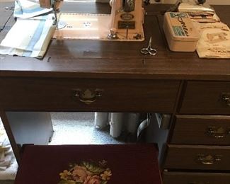 Vintage Pink Atlas Deluxe Electric sewing machine in wood cabinet
Needlepoint stool