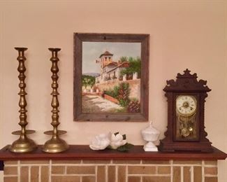 Vintage Seth Thomas mantle clock, brass candle sticks, and Spanish wall art