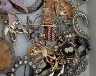 Some of the costume jewlery, there is also a Gucci Watch and some Sterling and Gold 