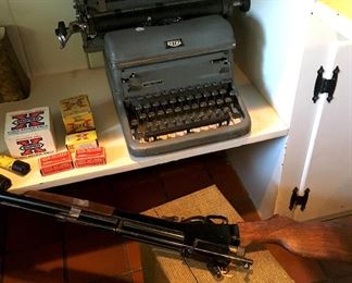 1920s Crosman 22 rifle, ammunition for various old rifles, vintage Royal typewriter, vintage slide projector