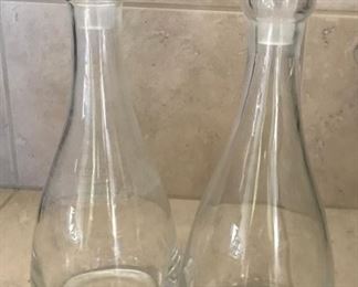 2 glass stopper bottles. 