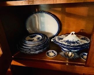 Flow blue plates tureens and accoutrements.