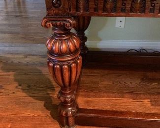 Detail of the highly carved library table.
