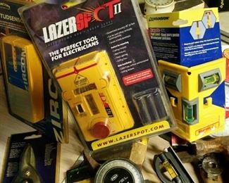 Laser spot tool and numerous leveling devices and professional measurement tools