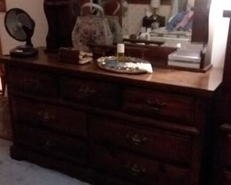 Wood dresser with mirror; vintage purses; fan