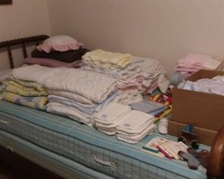 Jenny Lind Style twin bed; very large assortment of infant toddler blankets, bedding; washcloths and much more. Many are new!