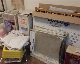 Assorted portable cribs; gliders and much more... still with box!