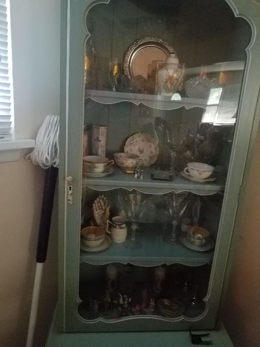 beautiful corner cabinet and contents