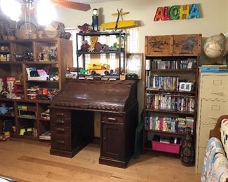 Antique Roll-Top Desk and Shelves of Vintage Toys