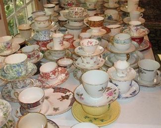 Many matched cups and saucers