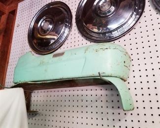 1956 Ford wheel covers (4) and seat edges