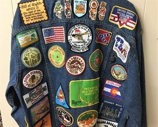 PATCHES GALORE ON THIS GREAT BLUE JEAN JACKET