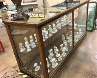 ANOTHER GREAT ANTIQUE DISPLAY CASE.  THIS ONE IS FULL OF PRECIOUS MOMENTS FIGURINES