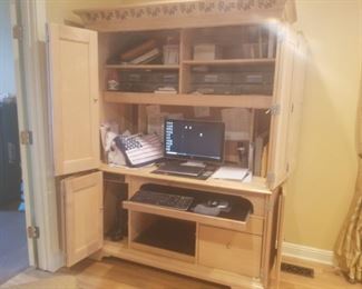 Desk that doors close. This is a great piece. Light wood with design