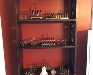 Collection of toast racks.  Many are sterling