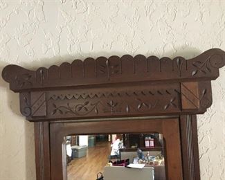 Hand carved detail on mirror