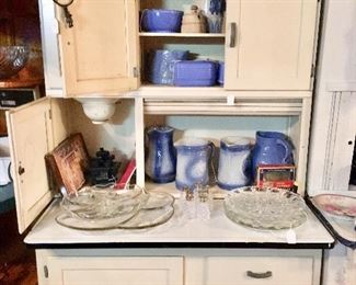 Hoosier cabinet filled with saltglaze pottery - late 19th and early 20th C.