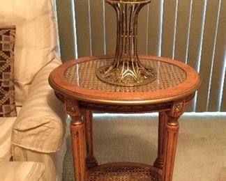 Wood with cane insets accent table.