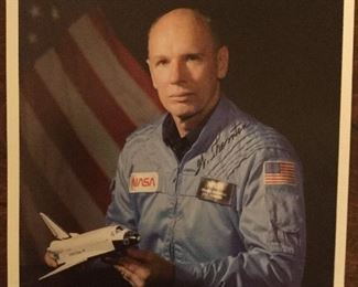 Official NASA photo of astronaut William Thornton with autograph