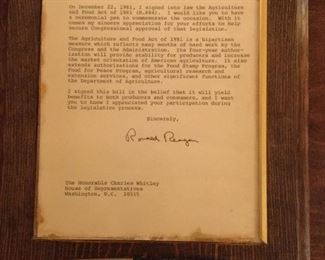 Letter from President Ronald Reagan to Congressman Charles Whitley with pen used to sign into law The Agriculture and Food Act of 1981.