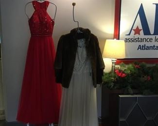 Just two of the amazing dresses! And the coat is Persian lamb.
