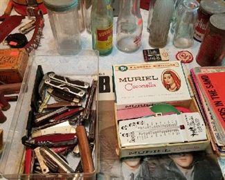 A nice selection of knives and Beatle items