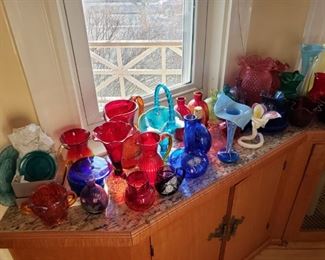 Pairpoint and other artisan blown glass vases and bowls, some hand painted.