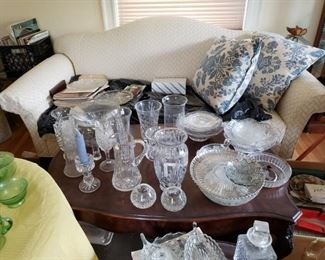 Blown glass and etched lead crystal vases and bowls. Custom upholstered couch (matching chairs not shown)