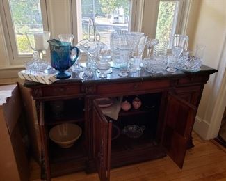 Lead crystal vases and bowls, including a blue Carnival Grape pitcher.