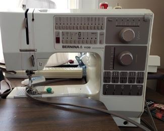 Top of the line Bernina 1130 sewing machine and accessories.  Sewing table also available.