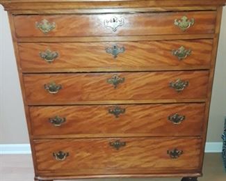 Antique curly maple or tiger stripe, colonial style chest, with bun feet. 