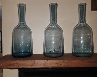 Nice selection of decorative colored glass, jars and bottles. 