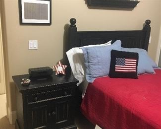 Full bed and bedside table