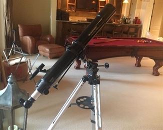 Telescope, pool table shown in background