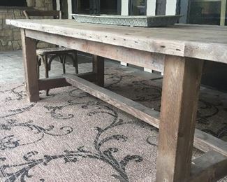 Another view of the table shown with outdoor rug