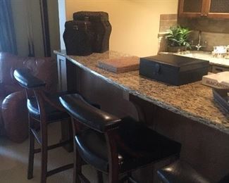Bar height leather stools by Bernhardt