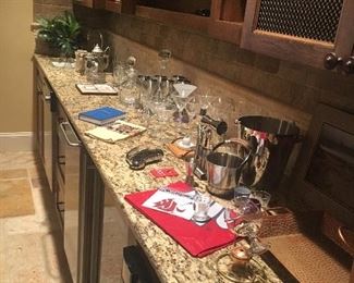 Bar accessories, including glassware, serving pieces, cocktail shakers etc