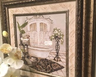 Framed print and faux orchid
