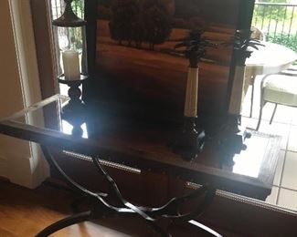 Another view of the table shown with home accessories and art