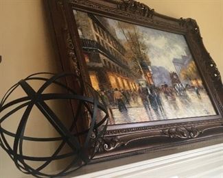 Metal sphere and framed print