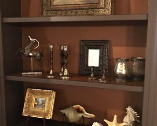 Home decor including mounted shells and shell on stand