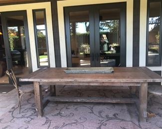 Restoration Hardware table and outdoor rug