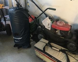 Lawnmower, SUP in bag and Eddie Bauer 10 x 10 canopy