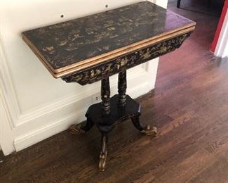 A Chinese export gilt decorated black lacquered game table.  Early 19th century.  30.75"h  x 31"w x 15.25 'd when closed as shown in this photo.  Valued at $2500 - $3500 asking $1200